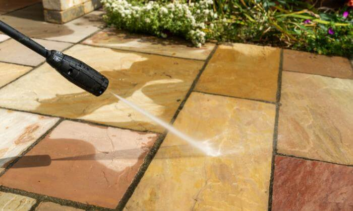 Washing paving stones with a pressure washer