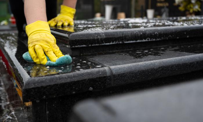 Washing the tombstone